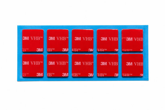 Genuine 3M VHB 5952 black double sided sticky pads, 10 square adhesive pads on a blue backing sheet for permanent mounting applications.