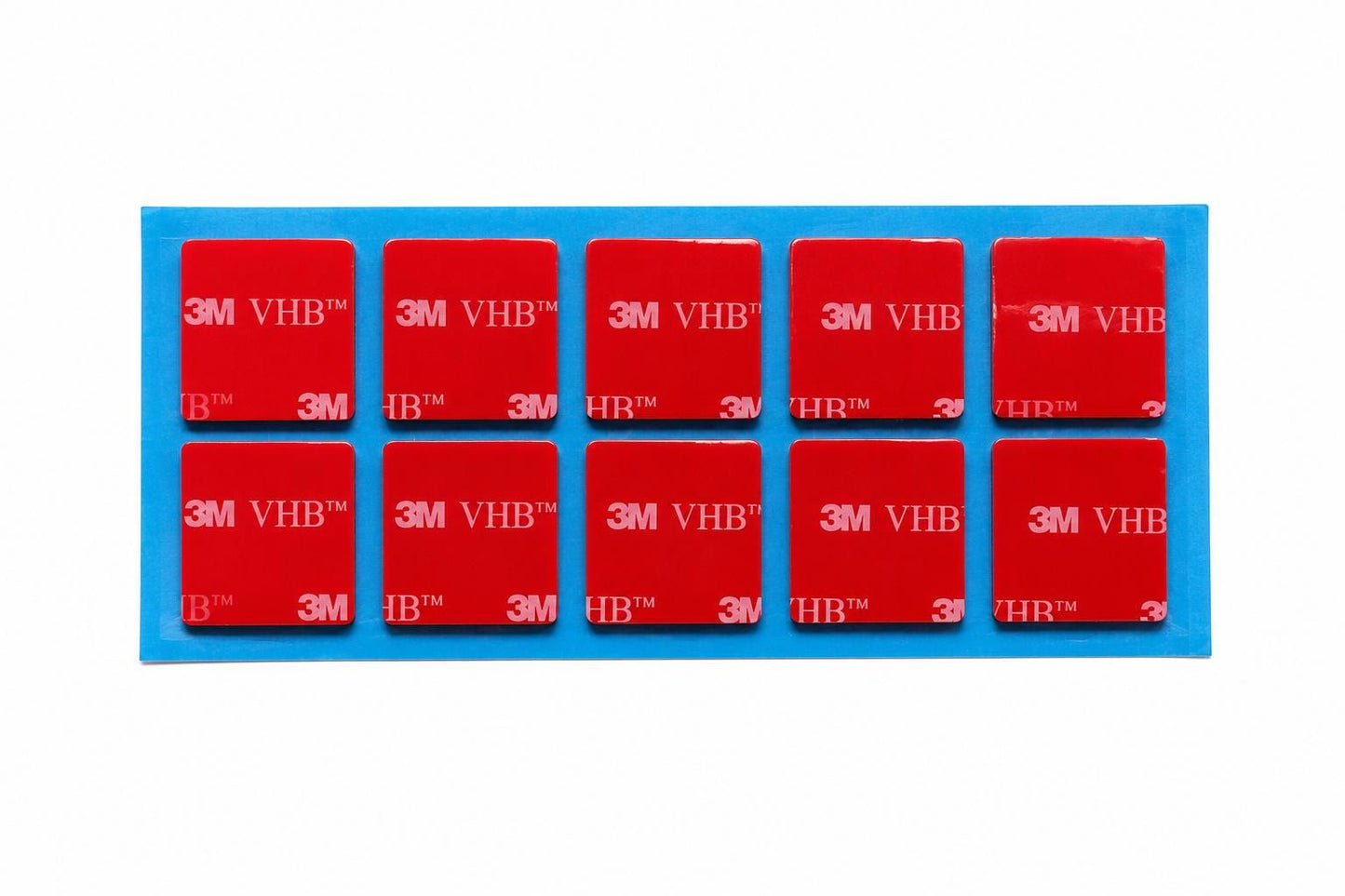 Genuine 3M VHB 5952 black double sided sticky pads, 10 square adhesive pads on a blue backing sheet for permanent mounting applications.