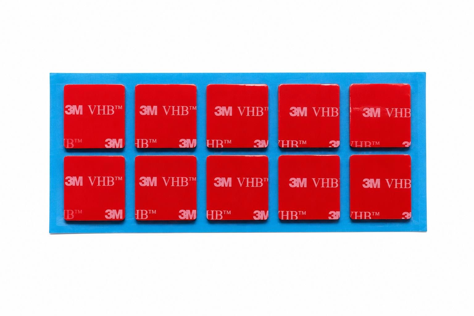 Genuine 3M VHB 5952 black double sided sticky pads, 10 square adhesive pads on a blue backing sheet for permanent mounting applications.